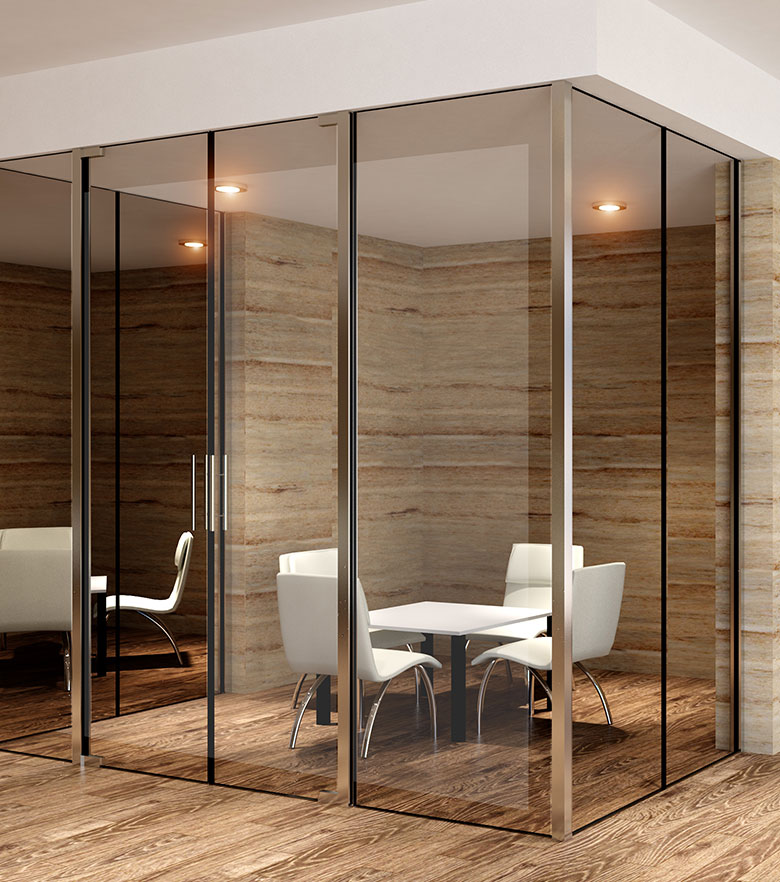 Commercial office interior with custom glass partitions and installations.