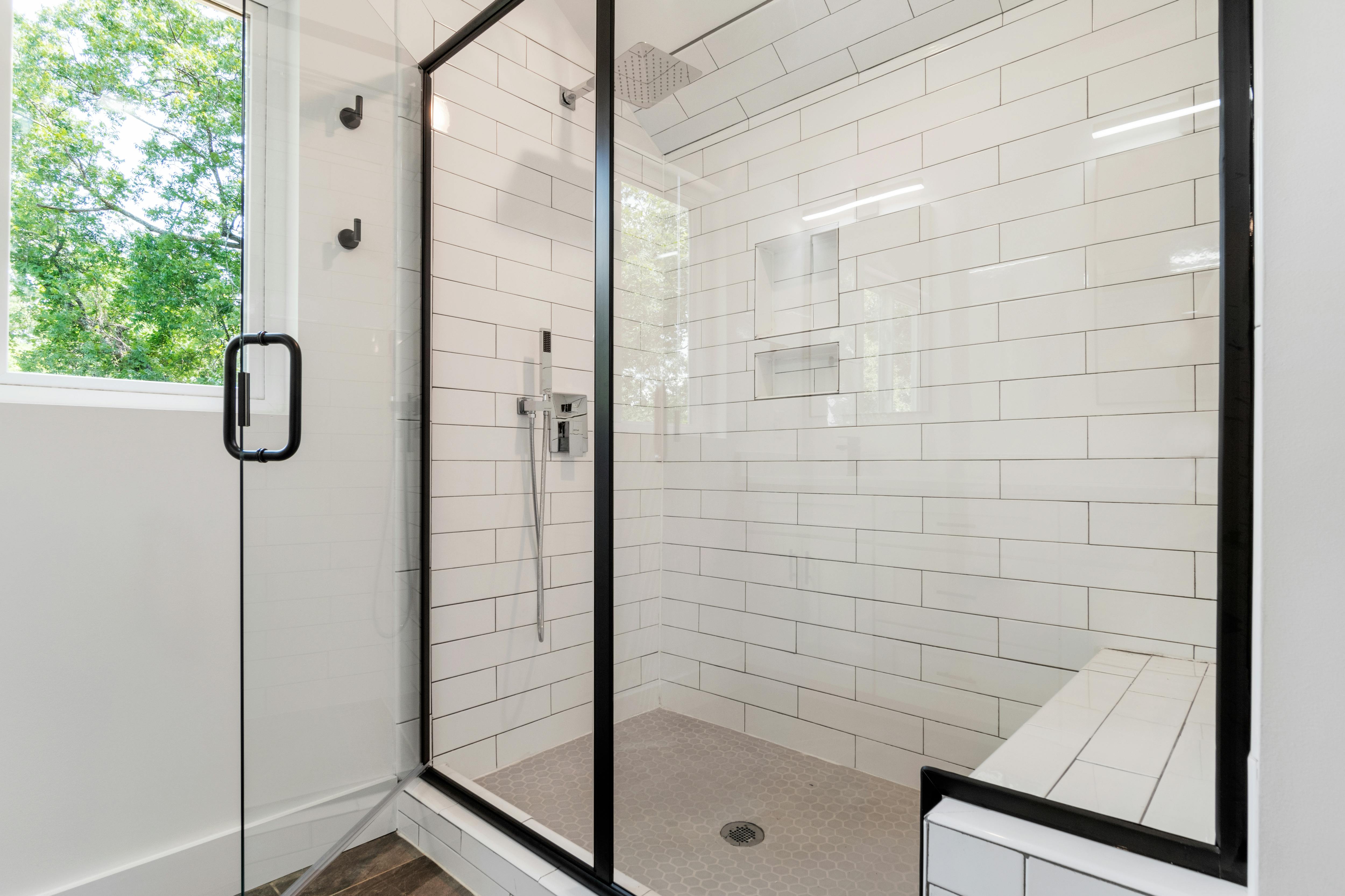 Residential glass repair and refinement by Illusions.